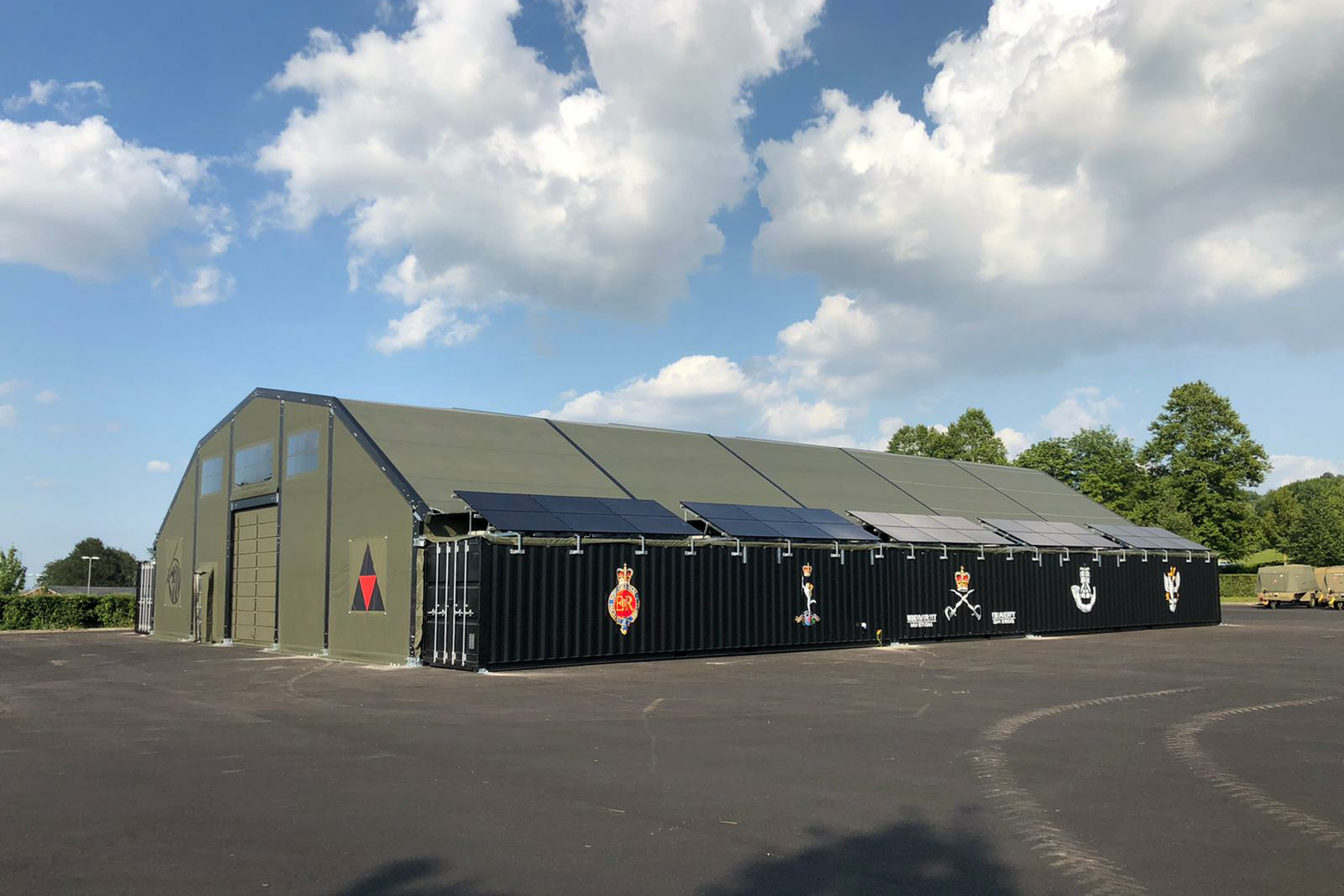 NIXUS supplied 3 Gyms for the British Army based on our unique Container Buildings. Each Gym is made up of 2 rows of ISO Containers bridged by a fabric roof. Overall size is 100ft x 60ft.